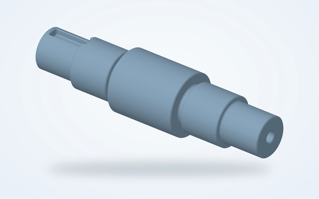 Stepped shaft with bearing seats, shoulder transitions and a machined flat