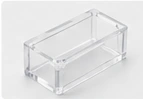 Clear acrylic-style machined enclosure — AI-generated illustration, not a vetcnc photograph