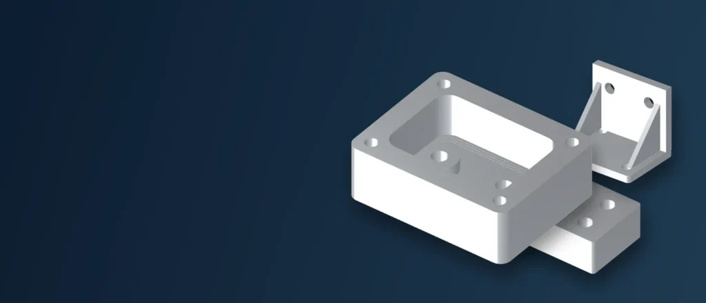 Illustrative machined housing, bracket and fixture block; not factory photography