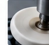 Mechanical polishing illustration — AI illustration, not a vetcnc photograph or a verified PMMA sample