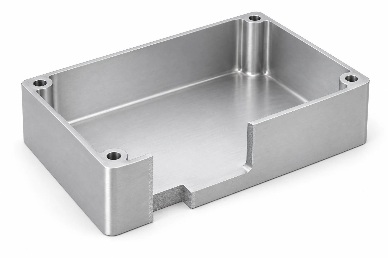 Cutaway aluminum housing exposing the remaining floor and side-wall sections around a deep pocket