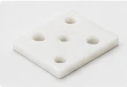 Polymer spacers and guide components — illustrative geometry, not a clinical-use component