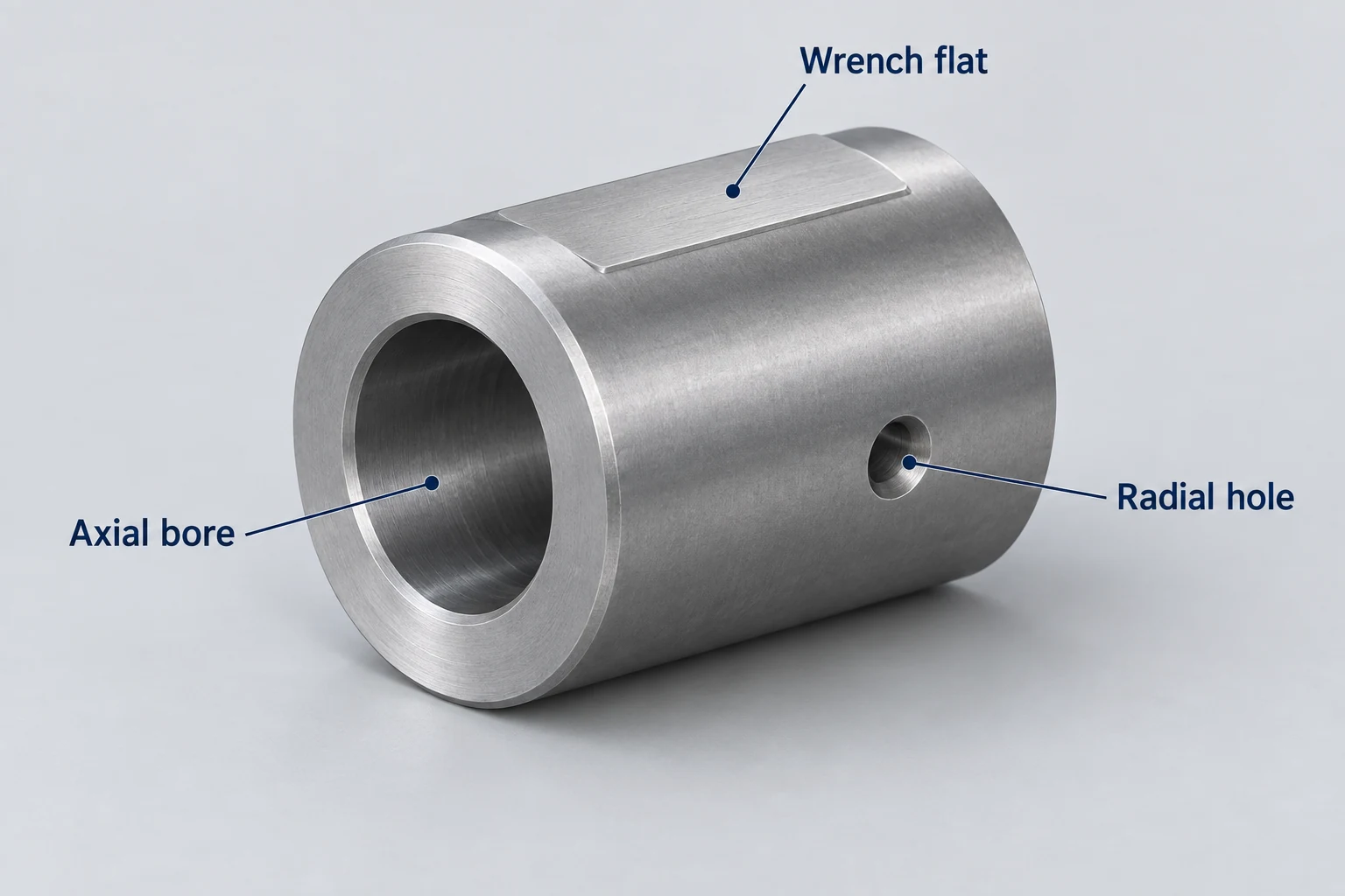 A coupling sleeve showing its axial bore, wrench flat and radial hole.