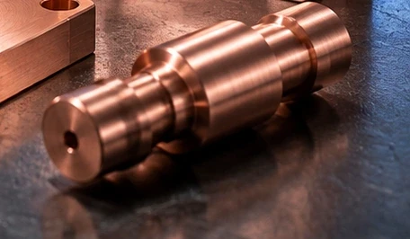 Turned copper contact illustration — illustrative image, not a vetcnc customer part or factory photograph